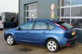 Ford Focus - 1.8-16V Ambiente Flexifuel (126pk) Navi /Airco /Cruise /Elek. pakket /Radio-CD /Stoelve - 1 - Thumbnail