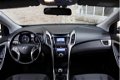 Hyundai i30 - 1.6 GDI Go 2014, LMV, PDC, Bluetooth, Cruise control, Getinte ramen, 33.981km etc - 1 - Thumbnail