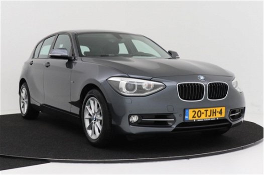 BMW 1-serie - 118i Business Sport | Leer | Sportstoelen | Xenon | Breed scherm - 1