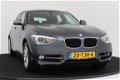 BMW 1-serie - 118i Business Sport | Leer | Sportstoelen | Xenon | Breed scherm - 1 - Thumbnail