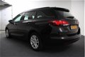 Opel Astra Sports Tourer - 1.0 Business+ (Airco/Navi/Bluetooth) - 1 - Thumbnail