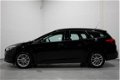 Ford Focus Wagon - 1.0 Trend 101 pk Navi, Airco, Cruise, PDC achter, NL Auto, NAP - 1 - Thumbnail