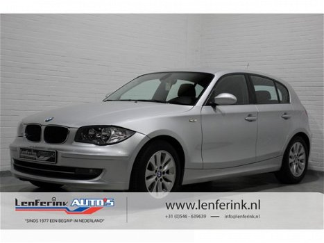 BMW 1-serie - 118i Business Line 143 pk, Airco, Cruise, Multifunctioneel stuur, Regensensor, NL auto - 1