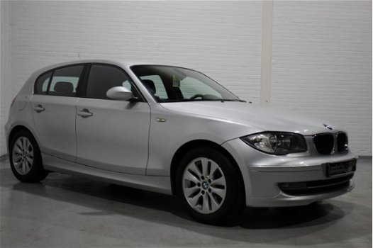 BMW 1-serie - 118i Business Line 143 pk, Airco, Cruise, Multifunctioneel stuur, Regensensor, NL auto - 1