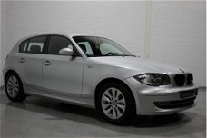 BMW 1-serie - 118i Business Line 143 pk, Airco, Cruise, Multifunctioneel stuur, Regensensor, NL auto