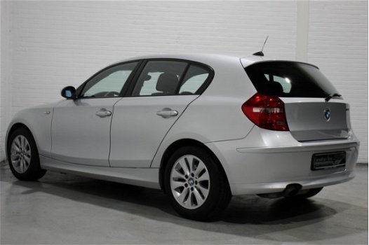 BMW 1-serie - 118i Business Line 143 pk, Airco, Cruise, Multifunctioneel stuur, Regensensor, NL auto - 1