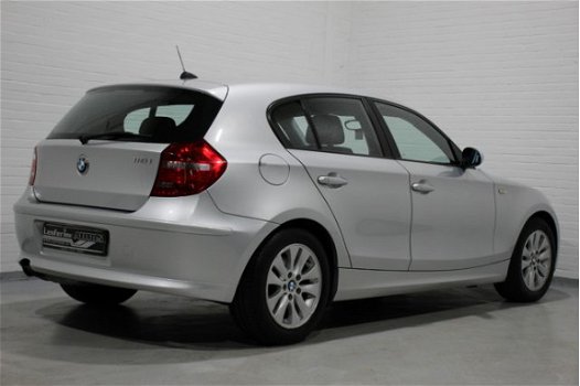 BMW 1-serie - 118i Business Line 143 pk, Airco, Cruise, Multifunctioneel stuur, Regensensor, NL auto - 1