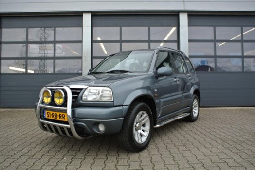 Suzuki Grand Vitara - 2.0 5-DEURS FreeStyle 3 - 1