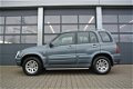 Suzuki Grand Vitara - 2.0 5-DEURS FreeStyle 3 - 1 - Thumbnail