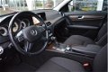 Mercedes-Benz C-klasse Estate - C180 AUTOMAAT ELEGANCE SCHUIFDAK/NAVI/PDC/LED/LM VELGEN - 1 - Thumbnail