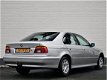 BMW 5-serie - 520i Automaat/Cruise/Airco/Bijtellingsvriendelijk - 1 - Thumbnail