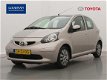 Toyota Aygo - 1.0-12V + | Airco | Half lederen bekleding | 5 Deurs | Origineel NL | NAP | - 1 - Thumbnail