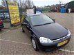 Opel Corsa - 1.2-16V Comfort - 1 - Thumbnail