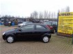 Opel Corsa - 1.2-16V Comfort - 1 - Thumbnail