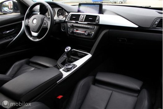 BMW 3-serie Touring - 320D Bi Xenon Sportstoelen Leer Sport Edition Groot Navi - 1