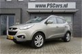 Hyundai ix35 - 2.0i i-Catcher Bluetooth/Cruise/Navi/Leder/Panorama/Stoelverwarming - 1 - Thumbnail