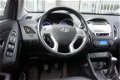 Hyundai ix35 - 2.0i i-Catcher Bluetooth/Cruise/Navi/Leder/Panorama/Stoelverwarming - 1 - Thumbnail