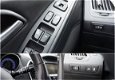Hyundai ix35 - 2.0i i-Catcher Bluetooth/Cruise/Navi/Leder/Panorama/Stoelverwarming - 1 - Thumbnail