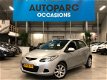 Mazda 2 - 2 1.3 S-VT Touring lage km airco 5 drs stoelverwarming - 1 - Thumbnail