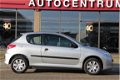 Peugeot 206 - 1.1 Accent 3drs Airco € 26, - p/maand - 1 - Thumbnail