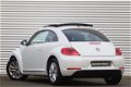 Volkswagen Beetle - 1.2 TSI Design | Airco | Panorama | Wit Parelmoer | 2xPDC | Navi Actie | 17 - 1 - Thumbnail