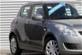 Suzuki Swift - 1.2 Comfort Automaat | Airco | PDC | Navi Actie | 5 Deurs - 1 - Thumbnail