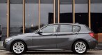 BMW 1-serie - 114i EDE Executive Parkeersensoren voor/achter | navi | Acc - 1 - Thumbnail