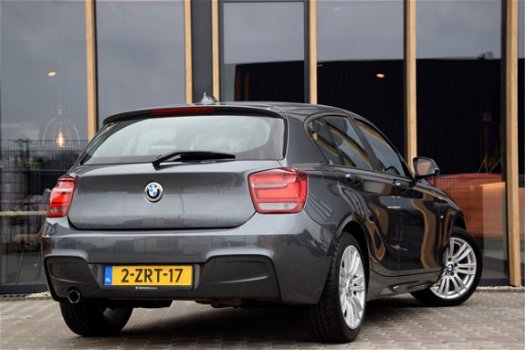 BMW 1-serie - 114i EDE Executive Parkeersensoren voor/achter | navi | Acc - 1