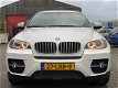 BMW X6 - XDrive35d 5 persoons - 1 - Thumbnail