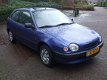 Toyota Corolla - 1.3-16V Terra stuurbekr 3 deurs blauw - 1 - Thumbnail