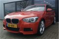 BMW 1-serie - 116i High Execuve M Sport + NAVI + XENON + LM VELGEN - 1 - Thumbnail