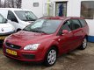 Ford Focus Wagon - 1.6 16V TREND Airco 181338km - 1 - Thumbnail