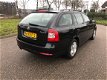 Skoda Octavia Combi - 1.4 TSI Ambition Business Line Navi - 1 - Thumbnail