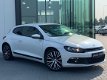 Volkswagen Scirocco - 2.0 TFSI Highline Plus 2013 Parelmoer - 1 - Thumbnail