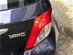 Toyota Yaris - 1.0 VVT-i Aspiration (Navi, Bluetooth, Achteruitrijcamera) - 1 - Thumbnail