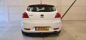 Kia Pro cee'd - 1.4 CVVT Navigator Plus Pack Airco | Navigatie | Cruise Controle | Parkeercamera - 1 - Thumbnail