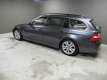 BMW 3-serie Touring - 330d High Executive, parkersensoren, clima, automaat - 1 - Thumbnail