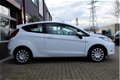 Ford Fiesta - 1.25 Titanium | Airco | Stoelverwarming | Elektrische ramen | 29.750 KM | APK | - 1 - Thumbnail