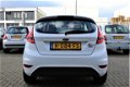 Ford Fiesta - 1.25 Titanium | Airco | Stoelverwarming | Elektrische ramen | 29.750 KM | APK | - 1 - Thumbnail