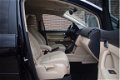 Volkswagen Touran - 1.2 TSI 105pk H6 Comfortline BlueMotion 7pers. Ecc Pdc Navigatie - 1 - Thumbnail