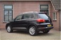 Volkswagen Tiguan - 2.0 TDI 110pk H6 Sport&Style Ecc Pdc Leder Navigatie - 1 - Thumbnail