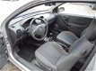 Opel Corsa - 1.0-12V Comfort Radio/CD - 1 - Thumbnail