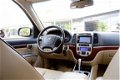 Hyundai Santa Fe - 2.2 CRDi Supreme Automaat*NL-Auto*Navi/Leder/Stoelverw./Parkeersens./Cruise-Contr - 1 - Thumbnail