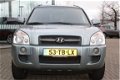 Hyundai Tucson - 2.0i 4WD STYLE RIJKLAAR INCL 6 MND BOVAG - 1 - Thumbnail