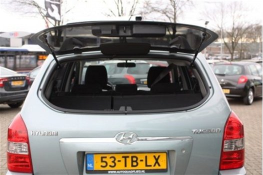 Hyundai Tucson - 2.0i 4WD STYLE RIJKLAAR INCL 6 MND BOVAG - 1