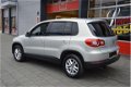 Volkswagen Tiguan - 1.4 TSI Comfortline Business Navigatie I Airco I Sport velgen I Dealer onderhoud - 1 - Thumbnail