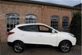 Hyundai ix35 - 1.6i GDI i-Vision 2013 121.449Km Navi Leder Clima Cruise Camera - 1 - Thumbnail