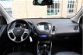 Hyundai ix35 - 1.6i GDI i-Vision 2013 121.449Km Navi Leder Clima Cruise Camera - 1 - Thumbnail