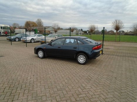 Mazda 323 - APK NIEUW AUTOMAAT AIRCO PERFECT RIJDEND - 1