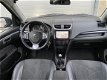 Suzuki Swift - 5-DEURS 1.2 Style, NAVI, CAMERA, HALFLEDER, CRUISE - 1 - Thumbnail